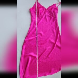 Japra hot pink 100% polyester slip dress with a sweetheart neckline and ruffled